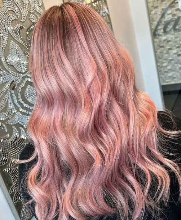 why is my hair turning pink